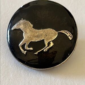 Black and Silver Horse Brooch/necklace vintage
silver design band around brooch